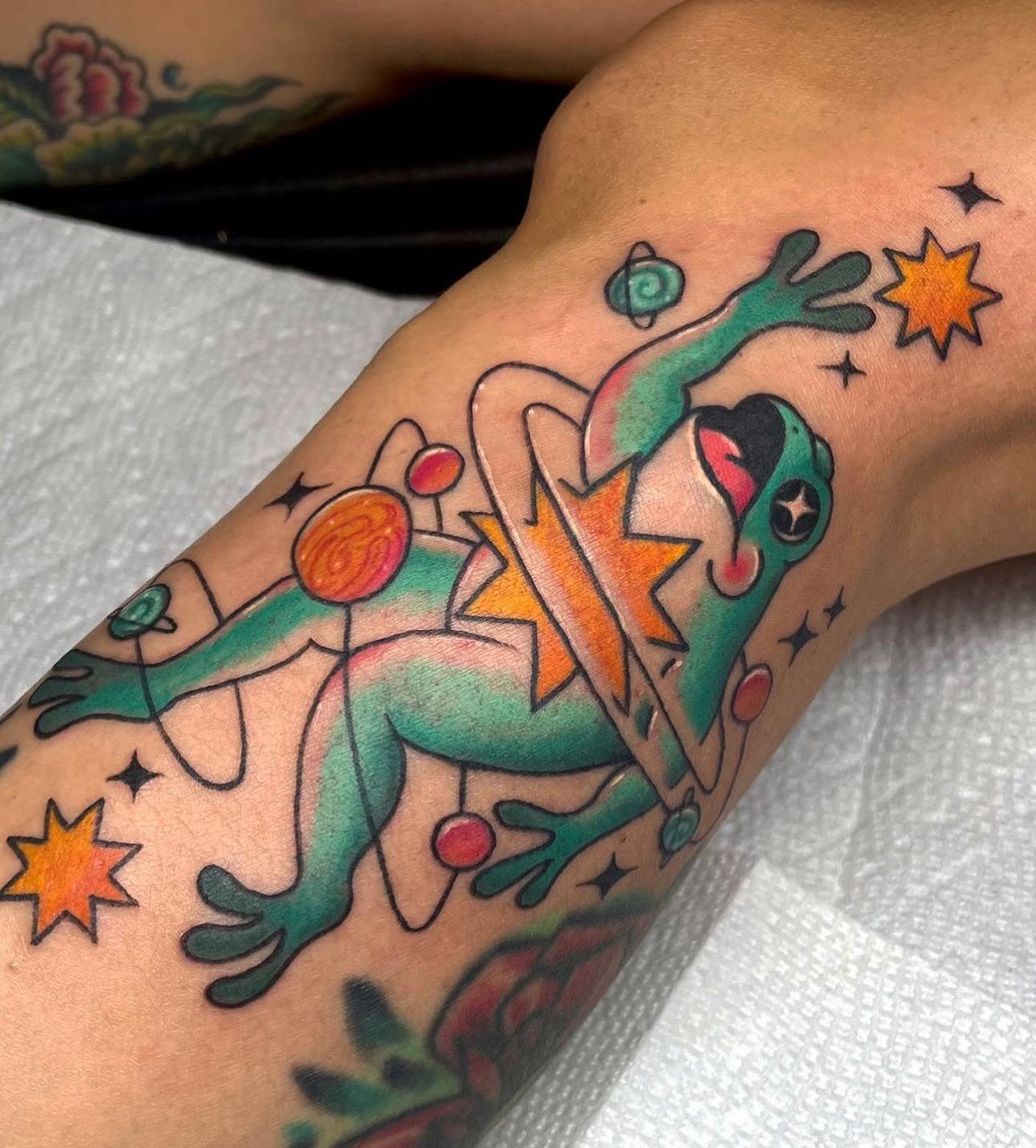 Frogs & Stars tattoo by Lexi at Ebb and Flow